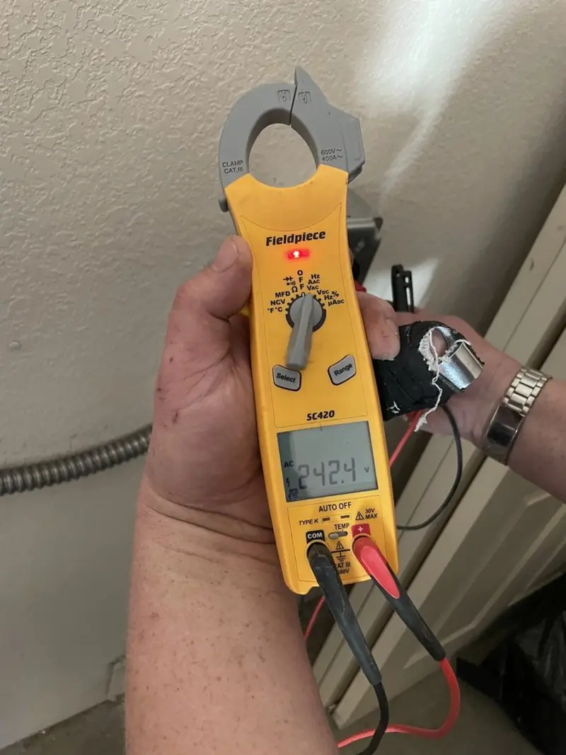 Voltage testing with clamp meter during Circuit Breaker Repair in Goffstown